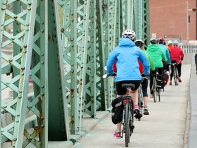 File photo: Cyclists cross between Ottawa and Gatineau using the Chaudière Bridge.