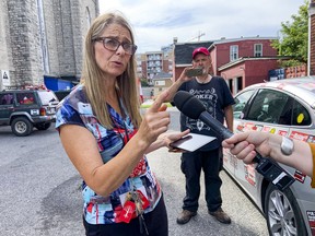 Diane Nolan, one of the directors of The United People of Canada, spoke outside the former St. Brigid's church site in Lowertown after a bailiff on Wednesday came to the facility to change its locks due to an issue over rent payments, according to witnesses.