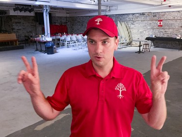 The United People of Canada (TUPOC) director William Komer speaks with members of the media in the basement of the former St. Brigid's church in Lowertown on Sunday, Aug. 21, 2022.