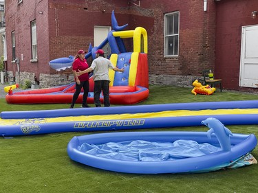 The United People of Canada (TUPOC) were setting up inflatable play structures at the former St. Brigid's church in Lowertown, Sunday, Aug. 21, 2022.