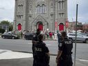 Ottawa police were filmed patrolling around the former St Brigid Church in Lower Town, where members of the Canadian National Coalition reside.