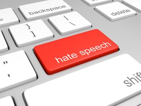 3D render of a computer keyboard with one key labeled for hate speech, representing discriminatory messages that plague online message boards and comment areas.