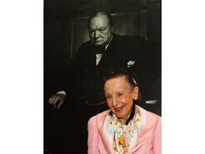 Estrellita Karsh wife of legenary photographer Yousuf Karsh stands in front of the iconic 1941 photograph of Winston Churchill taken by her husband in the Speaker of the House of Commons' chambers on Tuesday July 14, 2009.