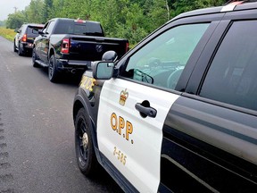 One of three allegedly stolen Dodge Ram pickups captured by  Dodge Ram trucks OPP East Region on Highway 401 Tuesday.