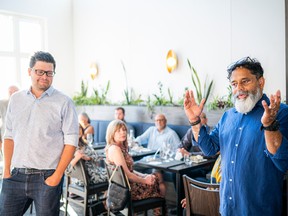 Chef and owner of Coconut Lagoon, Joe Thottungal (right), made a minor opening last weekend to welcome guests to his restaurant, two years after a fire destroyed his former space.