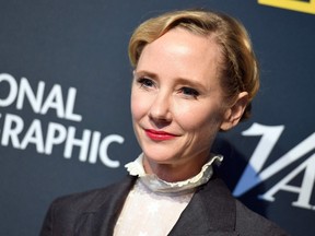 (FILES) In this file photo taken on January 11, 2018 actress Anne Heche attends Variety's Presents: Salute To Service event in New York City. - Hollywood actor Anne Heche has been declared legally dead, one week after she crashed her car into a Los Angeles building, a spokeswoman said on August 12, 2022. Heche, 53, had been comatose in hospital with a severe brain injury since the fiery collision on August 5.
