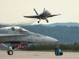 Files: A Canadian Forces CF-18 Hornet comes in for a landing at CFB Bagotville, Quebec in 2018.