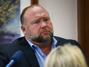 Alex Jones attempts to answer questions about his emails asked by Mark Bankston, lawyer for Neil Heslin and Scarlett Lewis, during trial at the Travis County Courthouse, Austin, Texas, U.S., August 3, 2022.