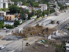 A look at the work during the long-awaited replacement of the Highway 417 overpass over Booth Street.