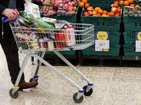 A shopper visits a Tesco Extra Supermarket in London, U.K.  'Best before' date labelling is changing at Tesco and other grocery outlets in Britain.