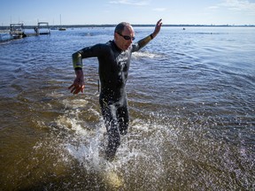 The Riverkeeper Open Water Swim race took place in the Ottawa River, starting and finishing at the Lac Deschênes Sailing Club, Sunday, August 14, 2022. Bruce McNicoll was running to the finish line of the 4K race Sunday morning.