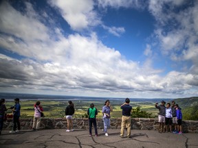 A file photo of visitors to Gatineau Park at the Champlain Lookout.