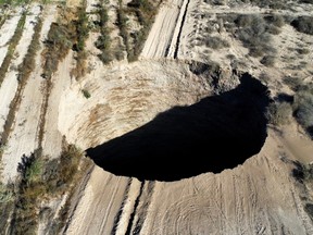 A sinkhole is exposed at a mining zone close to Tierra Amarilla town, in Copiapo, Chile, August 1, 2022.