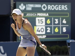 Romania's Simona Halep celebrates after beating United States' Jessica Pegula in Women's National Bank Open tennis semifinal action in Toronto on Saturday, Aug. 13, 2022.