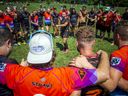 The San Diego Armada's Fabiano Sarmento, middle, speaks to players from his team and the Vancouver Rogues on Saturday morning.