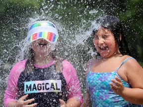 Pals Charlie Curry, 6, and Olivia Dicoratto, 8, seemed to have a blast the Barrhaven water park.