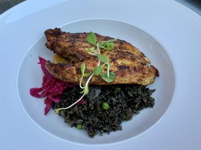 Blackened chicken with mushroom rice at J’ TM Resto Bar on Clarence Street