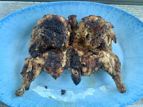A whole charcoal grilled chicken from Lazare's BBQ House on Montreal Road, photo by Peter Hum