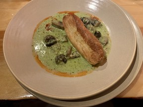 Escargots with pistou, mushrooms and tomato confit coulis at L’Orée du Bois in Chelsea