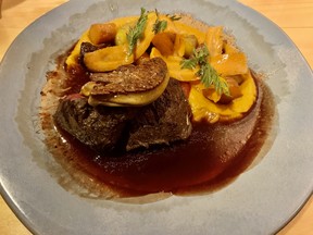Red deer medallions topped with foie gras, carrots and black peppercorn sauce at L’Orée du Bois in Chelsea
