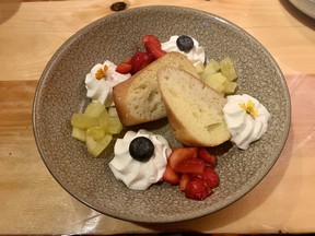 Rum Baba at with strawberries, pineapple and whipped cream at L’Orée du Bois