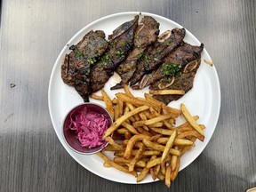 Main dish of ribs at J'TM Resto Bar on Clarence Street