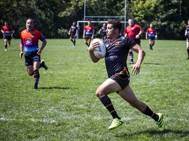 Joseph Scott of the San Diego Armada runs the ball to score a try during a game on Saturday.