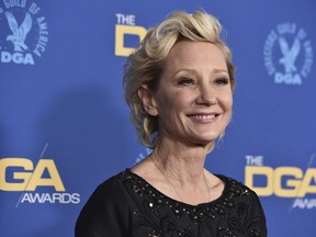 Anne Heche arrives at the 74th annual Directors Guild of America Awards on March 12, 2022, in Beverly Hills, Calif. A spokesperson for Heche says the actor is on life support after suffering a brain injury in a fiery crash a week ago and isn't expected to survive. The statement released on behalf of her family said she is being kept on life support to determine if she is a viable organ donor.