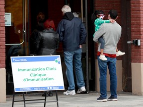 An October 2020 file photo of a pop-up flu shot clinic set up by Ottawa Public Health at the Horticulture Building in Lansdowne Park.