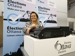 Michèle Rochette, the manager of municipal elections & French-language services for the City of Ottawa, poses for a photo at her office Friday.