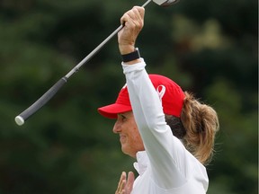 Lorie Kane played her final round of golf at the CP Women's Open at the Ottawa Hunt & Golf Club Friday. Lorie waves to the cheering fans after arriving on the 18th hole Friday.