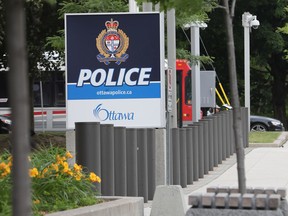 An Ottawa Ottawa Police detective is accused of improperly accessing child death files and contacting at least one family while searching for links to vaccines.