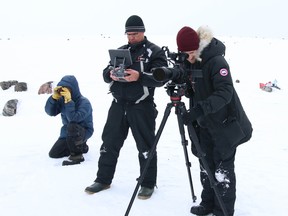 Handout photo for the documentary film Herd: Inuit Voices on Caribou. From left to right: Inuit knowledge holder Henry Lyall from Nain, Nunatsiavut, Inuit drone operator Eldred Allen from Rigolet, Nunatsiavut, and filmmaker David Borish filming caribou in Northern Labrador in 2018.