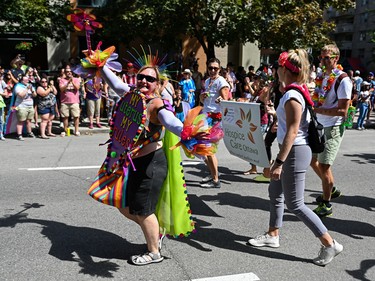 People take part in 2022 Capital Pride Parade in Ottawa on Sunday, Aug. 28, 2022.