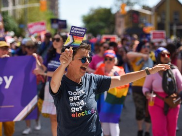 Ottawa mayoral candidate and Somerset Ward Coun. Catherine McKenney engages with participants of the 2022 Capital Pride Parade in Ottawa on Sunday, Aug. 28, 2022.