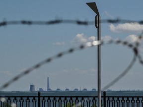 Zaporizhzhia Nuclear Power Plant is seen from an embankment of the Dnipro river in the town of Nikopol, as Russia's attack on Ukraine continues, in Dnipropetrovsk region, Ukraine July 20, 2022.