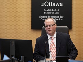 Justice William Hourigan heads the Ottawa Light Rail Transit Public Inquiry commission.