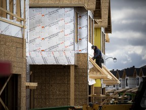 File: A view of new home build construction sites and crews working, in Ottawa's west end, in the Stittsville area.