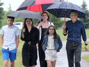 With his wife, Ginny, and three kids (Erica, 23, Jack, 10 and Kate, 13) Mark Sutcliffe announces his candidacy for mayor at a park in Kanata in late June.