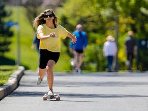 People get some exercise along the Queen Elizabeth Driveway, closed to vehicular traffic this past summer and much of the summer before. Next year, the NCC should keep The Driveway open for vehicles on weekdays, but closed to them on weekends.