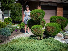 Georgina King is upset about the notice of violation she received from the city about her front yard rock garden. King was photographed at her home in the east end, Saturday, Sept. 3, 2022.