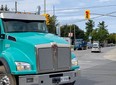 Heavy truck traffic in the heart of Manotick where Bridge Street and Manotick Main Street intersect.