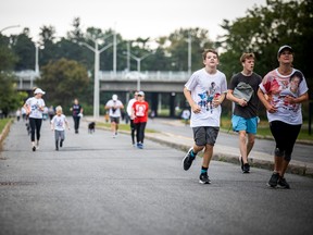 The Ottawa Terry Fox Run in support of cancer research was held along Colonel By Drive on Sunday, Sept. 18, 2022., despite some heavy rain at time during the day. More showers and thunderstorms are  in the forecast for Monday.