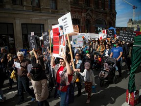 The Iranian community of Ottawa came together Sunday and marched in solidarity with the Iranian people in their protest against the oppressive Islamic Republic regime after the death of Mahsa Amini.