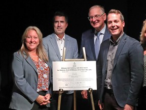 Left to right: Ottawa-Vanier MP Mona Fortier (also President of the Treasury Board), Stéphane Côté of DevMcGill, Jacques Frémont, president and cice-chancellor of the University of Ottawa, and city Coun. Mathieu Fleury attend the unveiling of a plaque to celebrate the completion of the Arts Court redevelopment project, Sept. 26, 2022.
