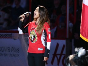 Jennifer Silva sings the national anthems at the Canadian Tire Centre. FILE
