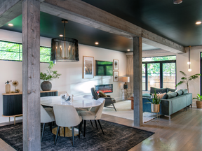 Barnboard-clad ceiling beams and the dark ceiling add cosy interest in this Amsted project.