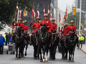OTTAWA — Royal Canadian Mounted Police (RCMP) Musical Ride lead the parade to Christ Church Cathedral for The National Commemorative Ceremony In Honour of Her Majesty Queen Elizabeth II , Monday, Sep. 19, 2022.
