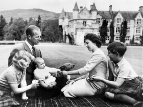 Queen Elizabeth II, shown here at Balmoral in 1960 with Prince Philip and three of her children, knew how to talk with young people — as Catherine Clark would later discover.