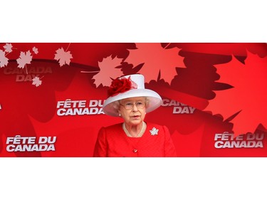 Queen Elizabeth delivers her speech from the stage on Parliament Hill set up for Canada Day festivities, July 1, 2010.